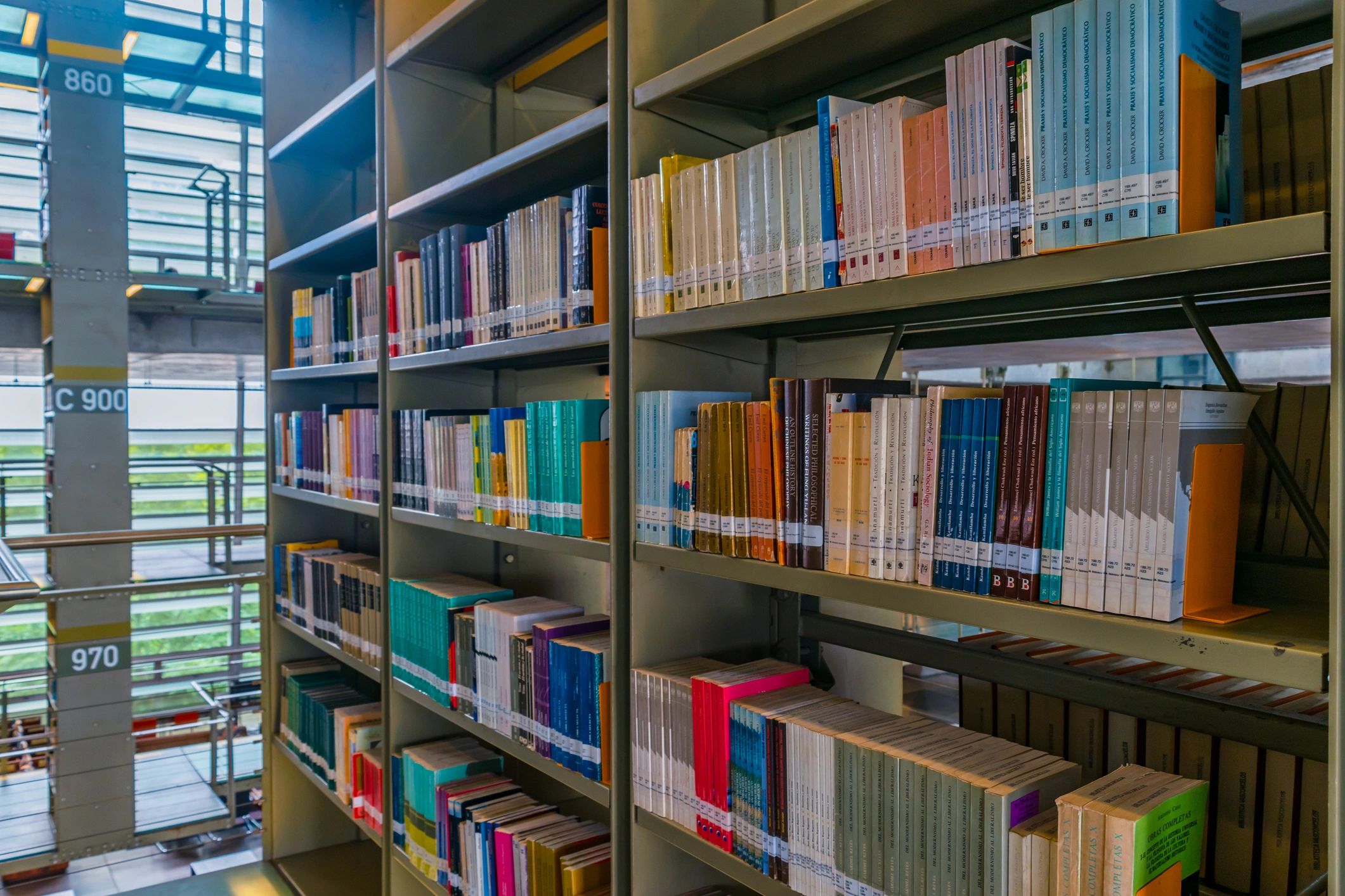 Reference books and archive shelves evoking an editorial library